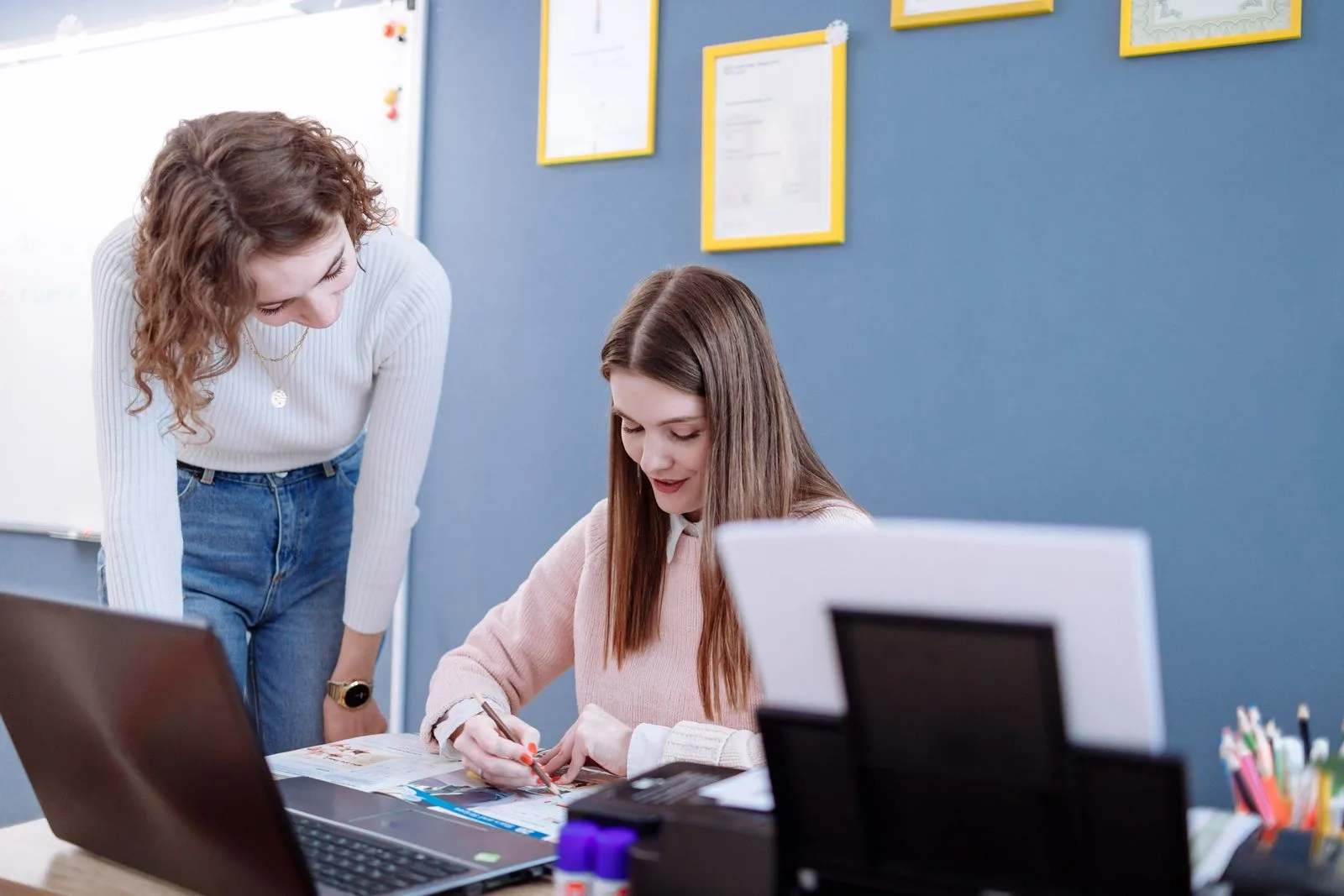 Two teachers collaborating together in a classroom